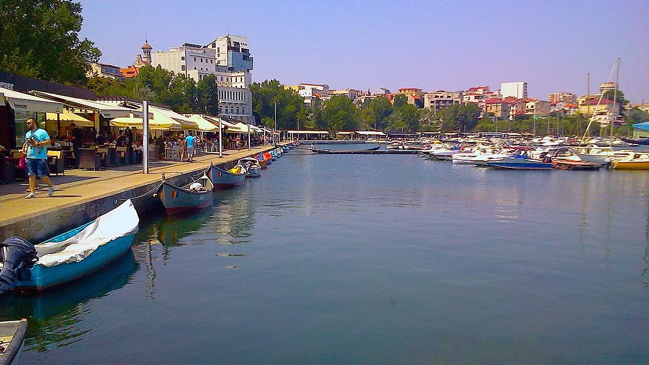 Yachts and restaurant terraces lining Portul Tomis, the small tourist marina in Constanta where the best seafood kitchens cluster