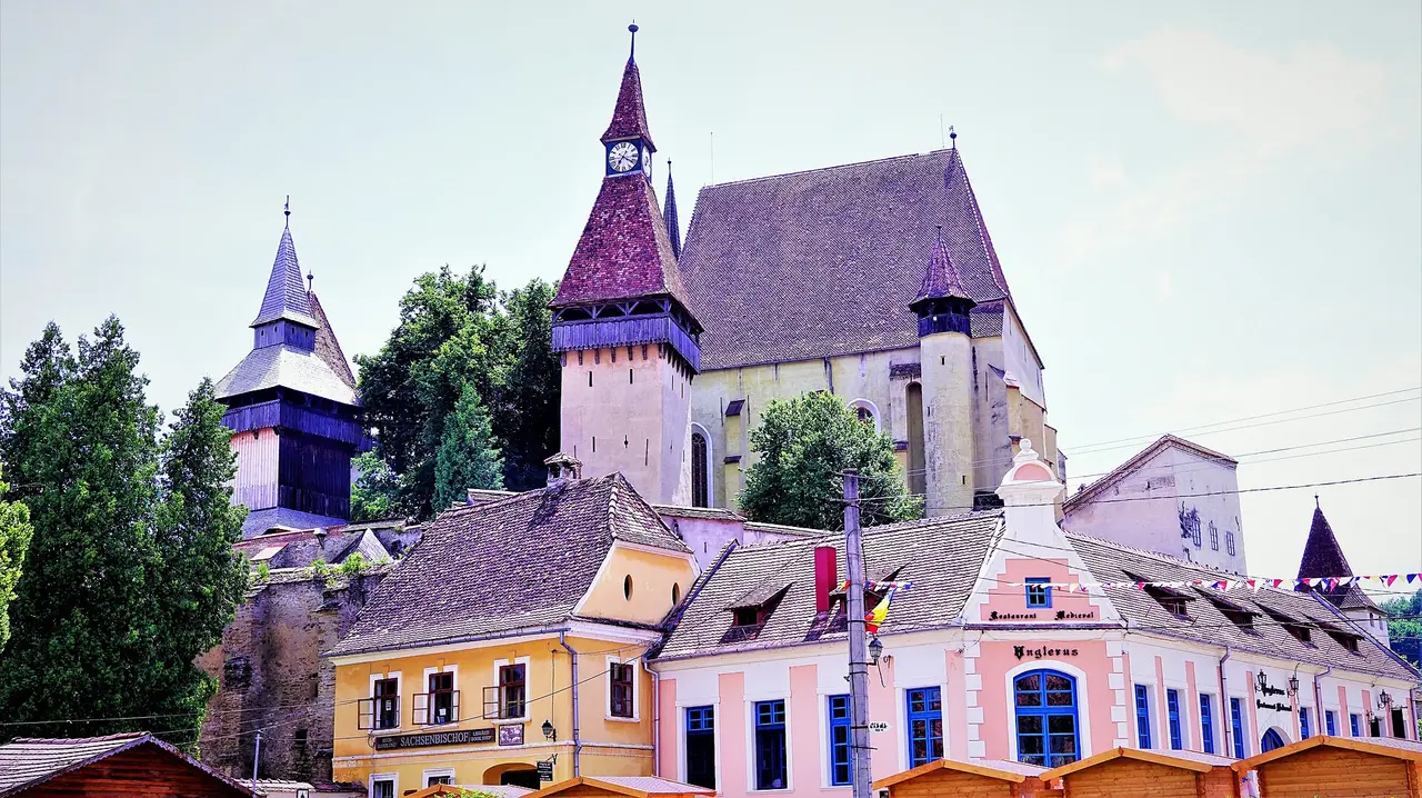 The fortified church of Biertan on its hill above the village roofs, ringed by walls and towers