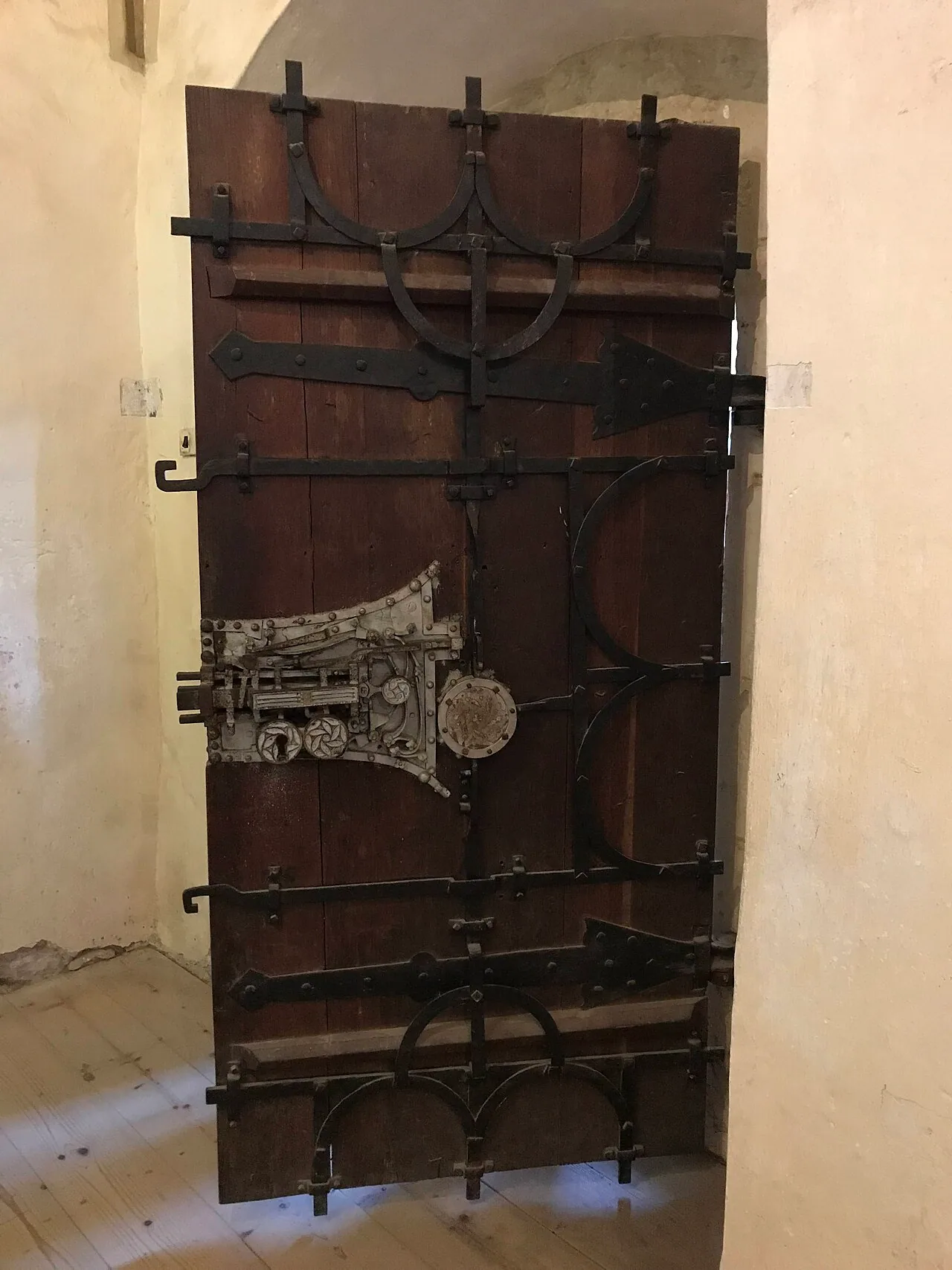 The 1515 sacristy door at Biertan with its exposed multi-bolt locking mechanism mounted on the timber