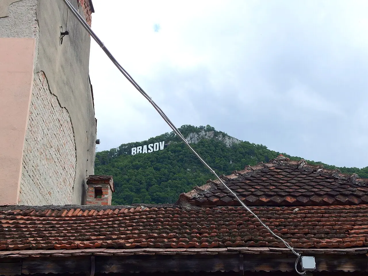 Historic centre of Brasov with church towers and tiled roofs, the destination of the short hop from GHV