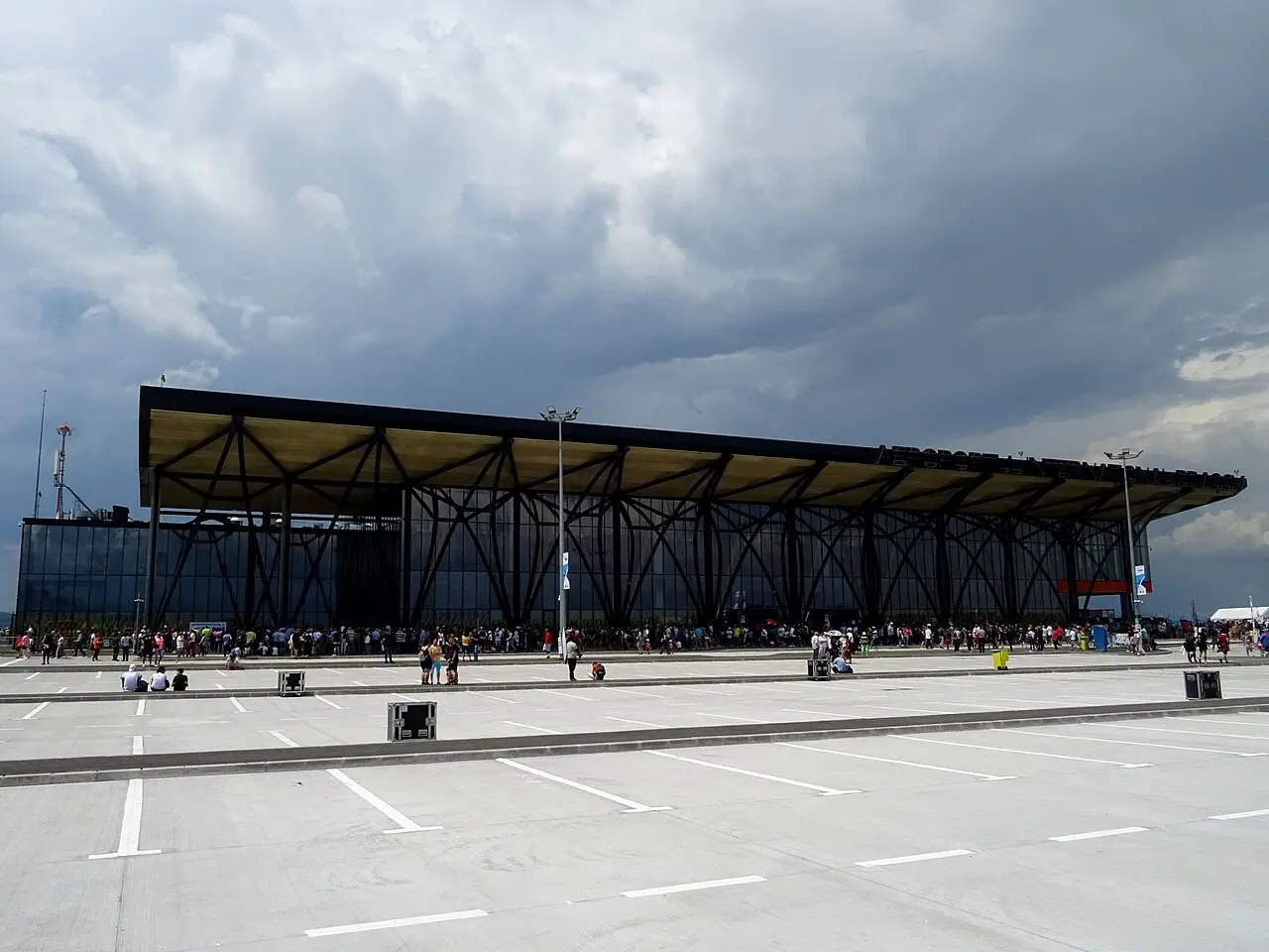 Passenger terminal facade at Brasov-Ghimbav International Airport with glass frontage and approach area