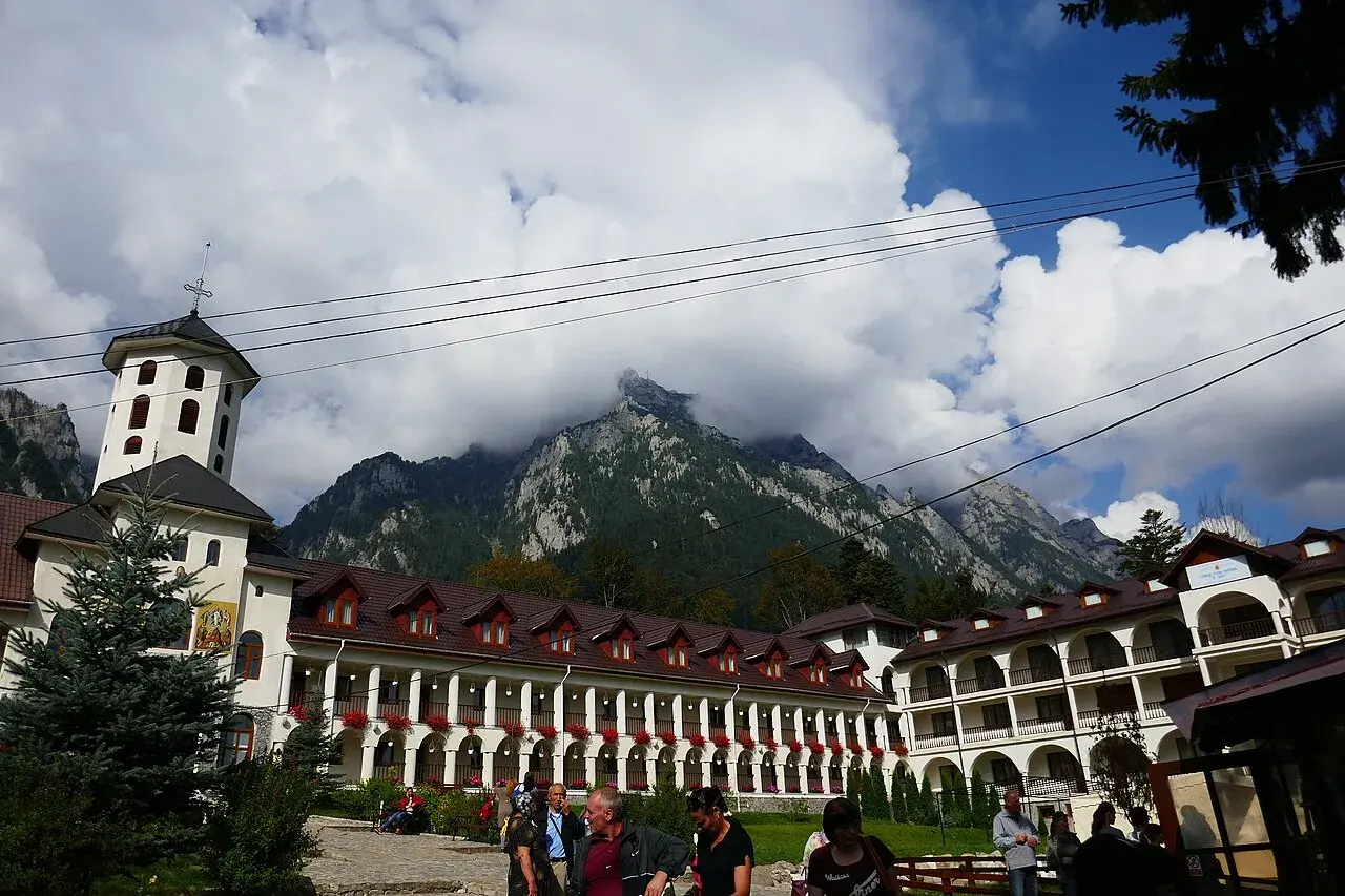 The grey peaks of the Caraiman and Bucegi mountains under dramatic cloud above Busteni in the Prahova Valley, the corridor between Bucharest and Brasov