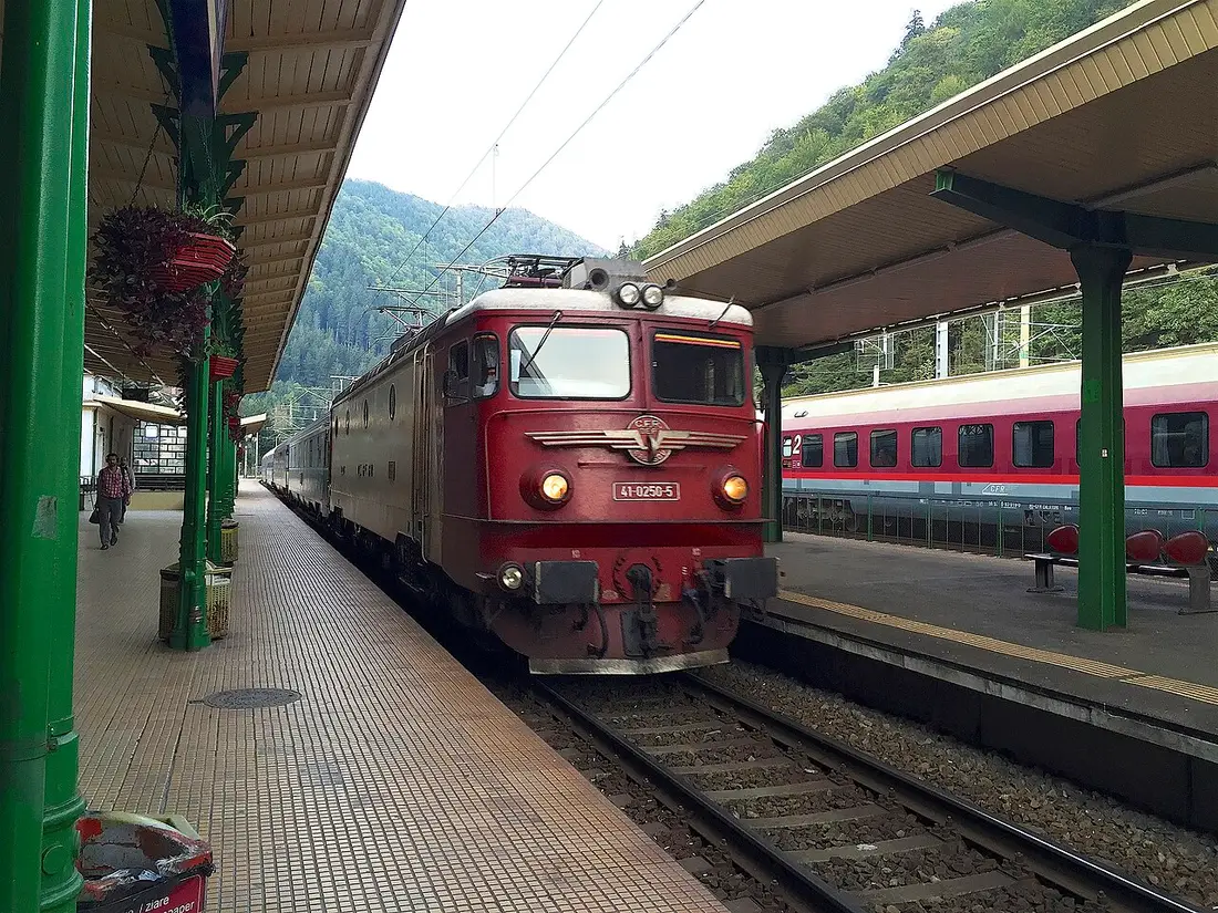 Blue CFR overnight coaches of the Ister sleeper train at a platform between Budapest and Bucharest