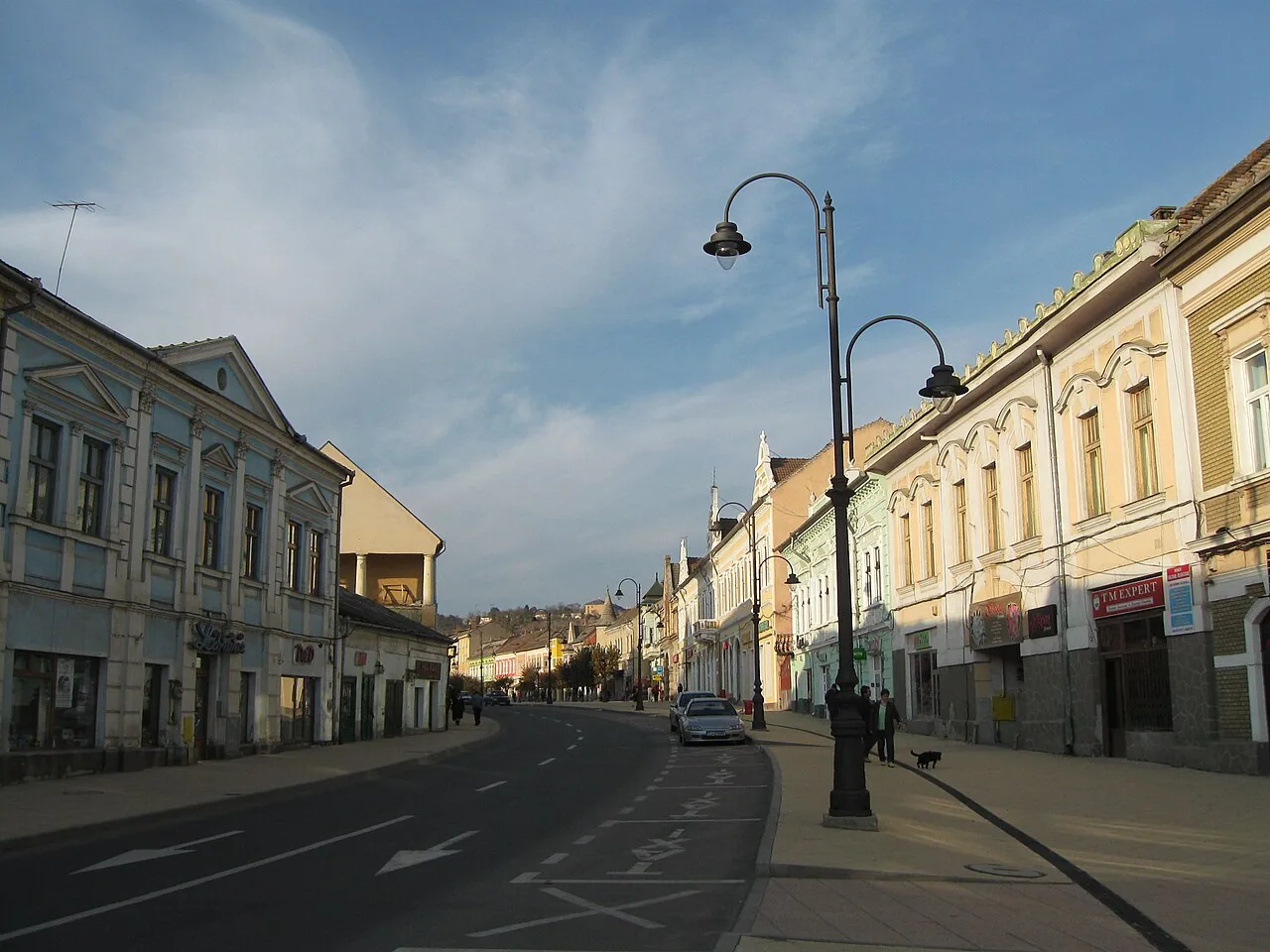 A street in the centre of Turda with older low buildings, the town where the Cluj bus drops you before the salt mine