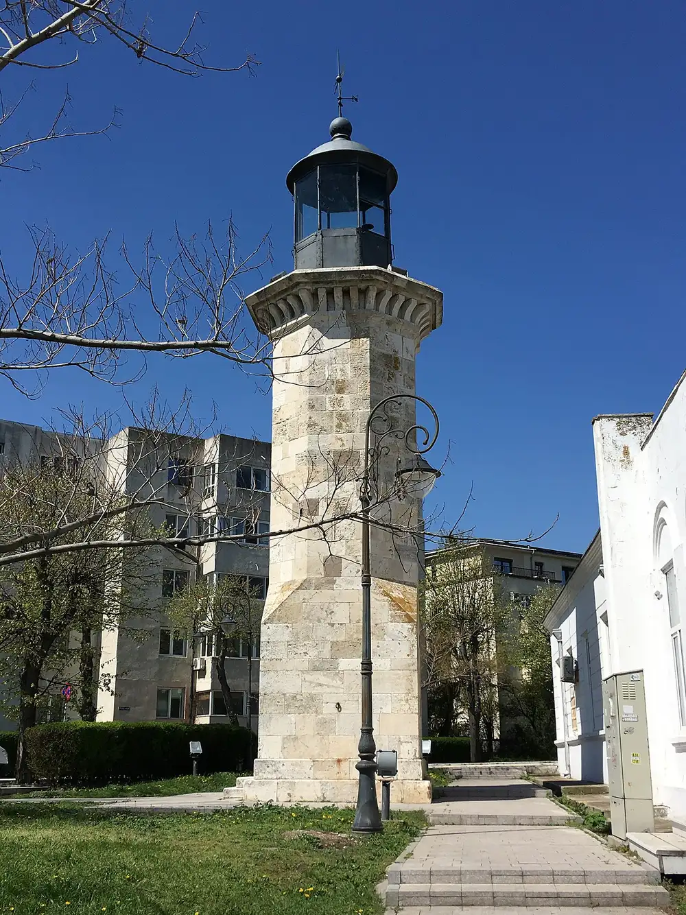 The small stone Genoese Lighthouse on the Constanta seafront promenade