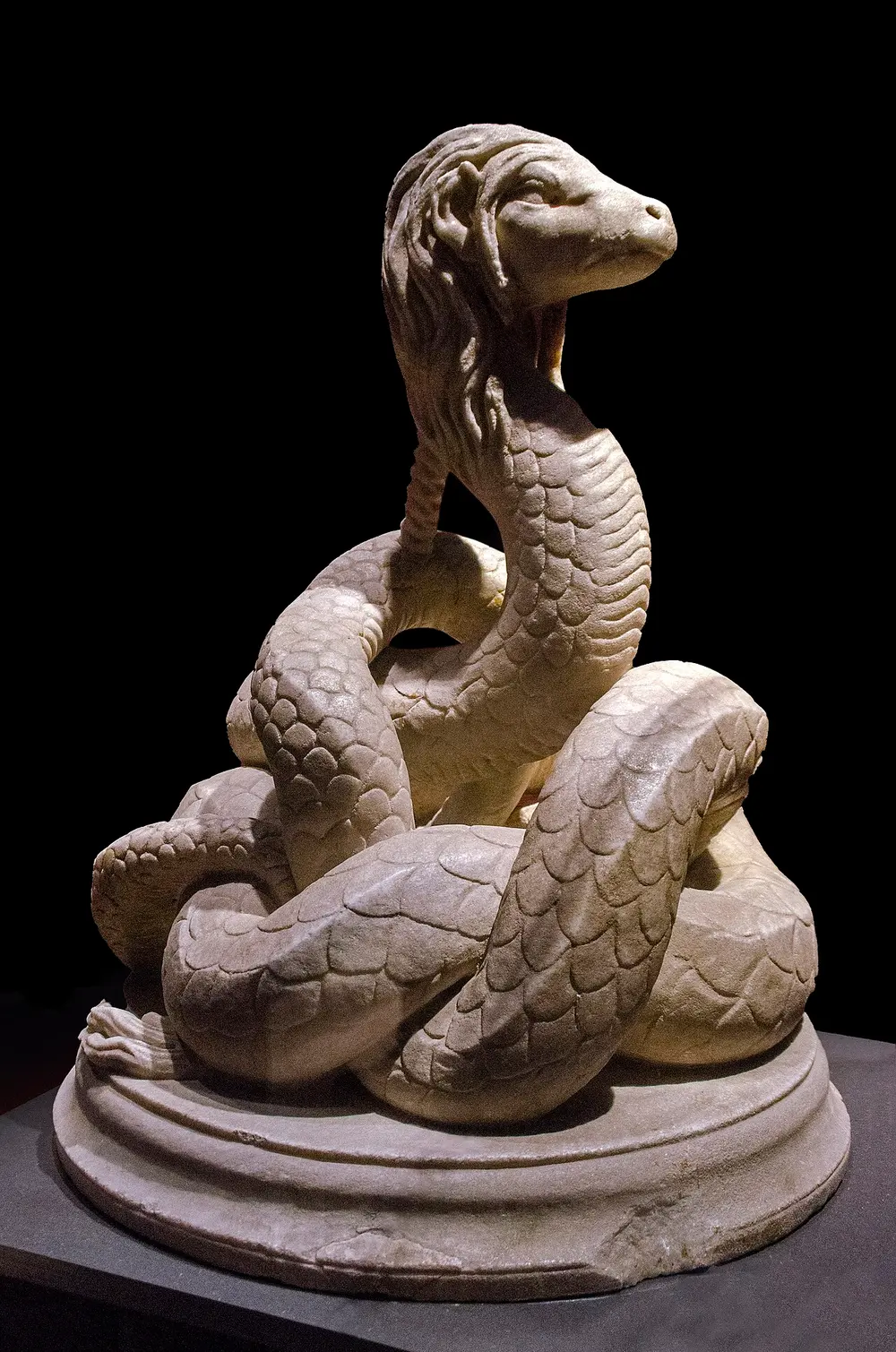 The marble Glykon Snake statue, an ancient serpent god carved from a single block, in the Constanta museum