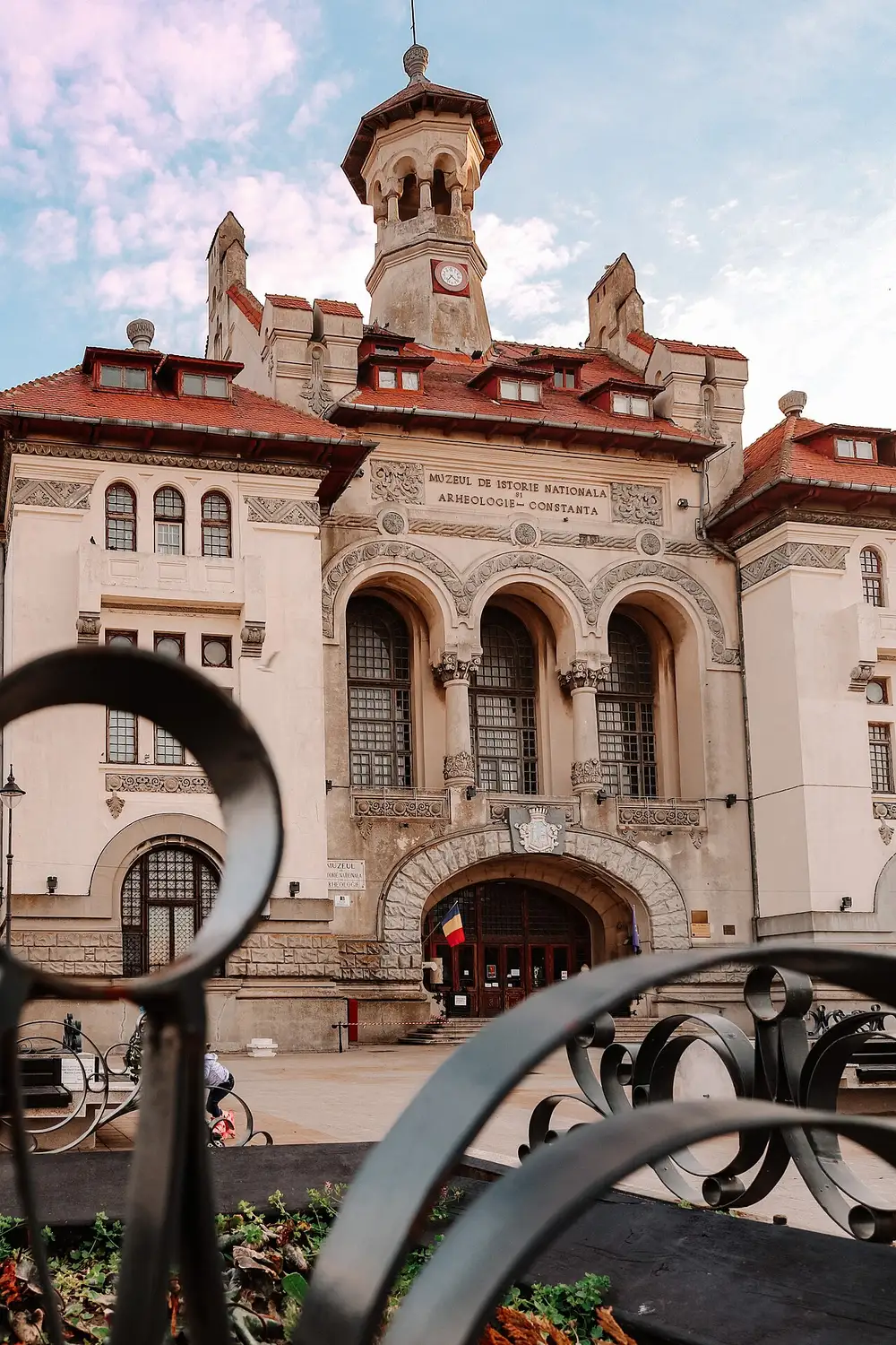The grand facade of the former city hall on Piata Ovidiu, now the National History and Archaeology Museum