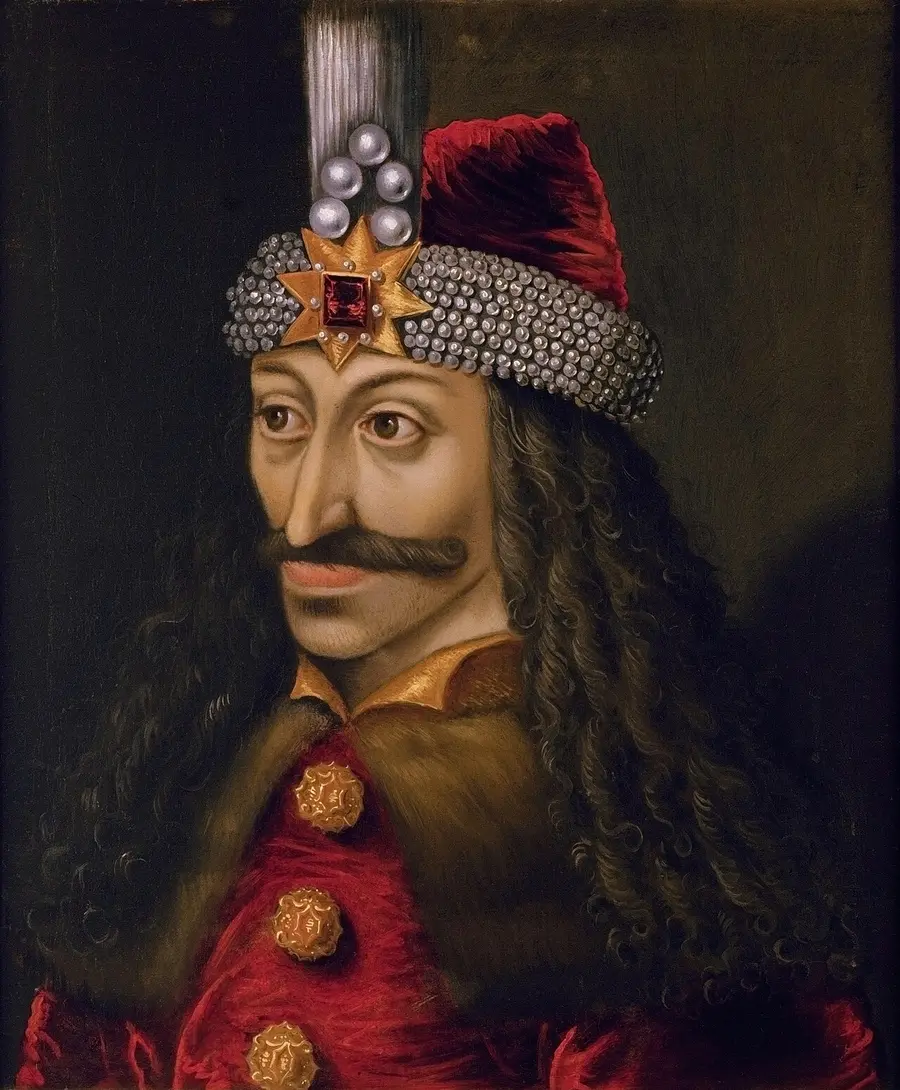 The 16th-century Ambras Castle portrait of Vlad the Impaler, in a red cap set with pearls and a jewelled star, with long dark hair and a heavy moustache