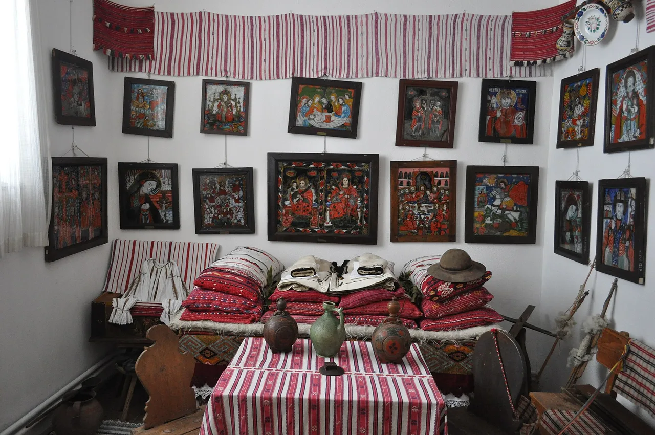 The Zosim Oancea Museum of Icons on Glass in Sibiel, a low whitewashed building by the church