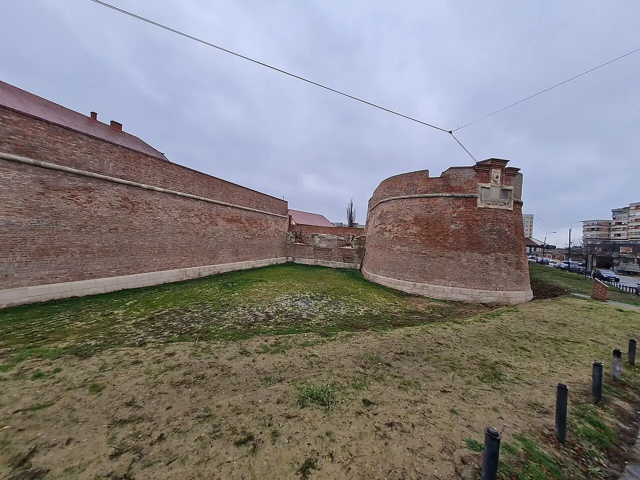 The brick bastions and grassy inner ground of Oradea Fortress, the star-shaped citadel in the middle of the city