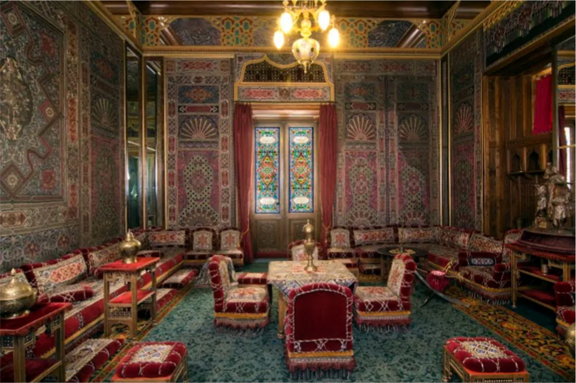 The Ottoman room inside Peles Castle, hung with carpets, lamps and low divans