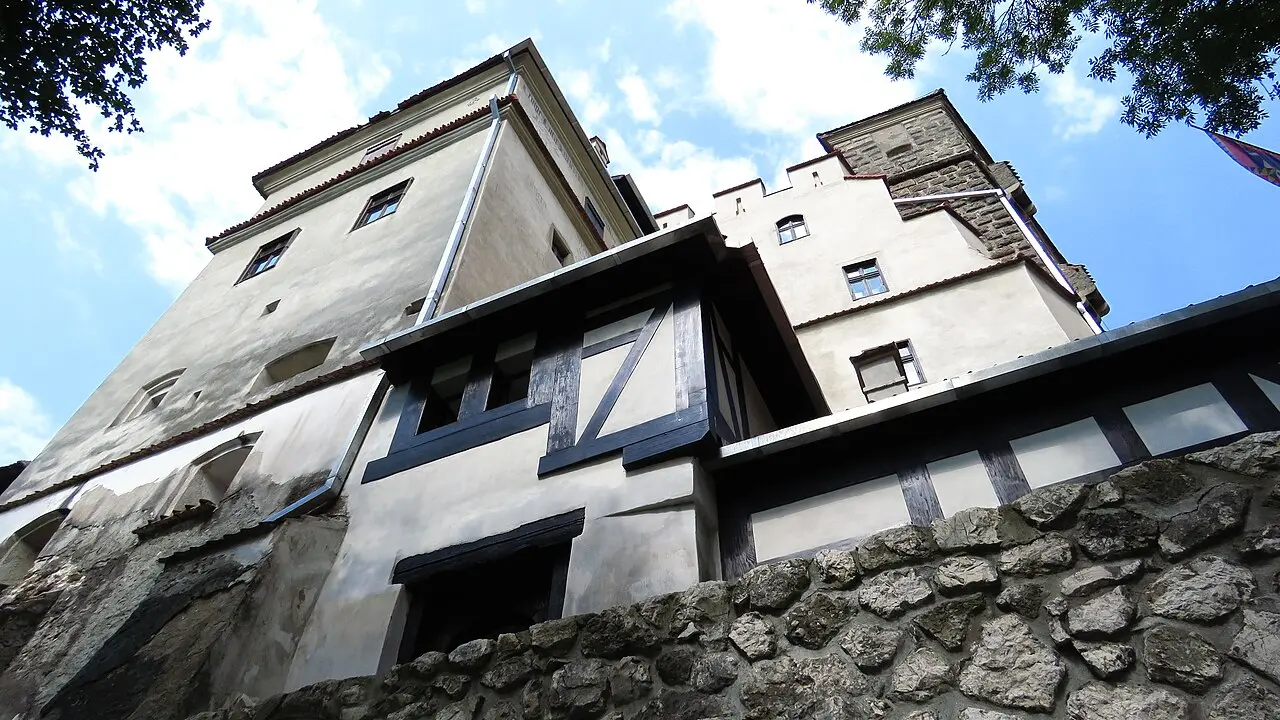 Bran Castle standing on its rocky outcrop, marketed as Draculas castle