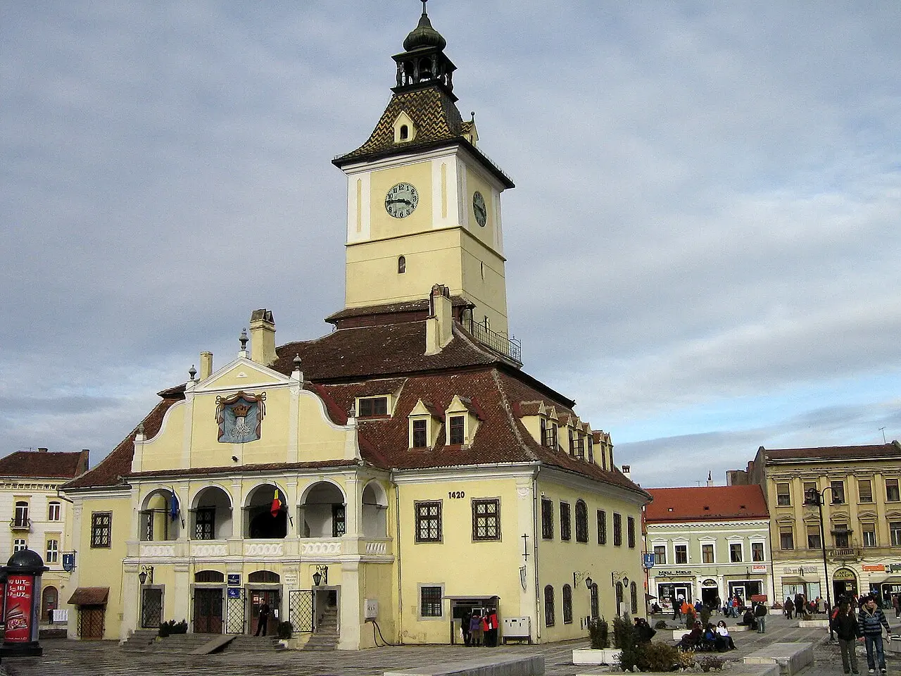 Council Square in Brasov, lined with colourful merchant houses and the old Council House