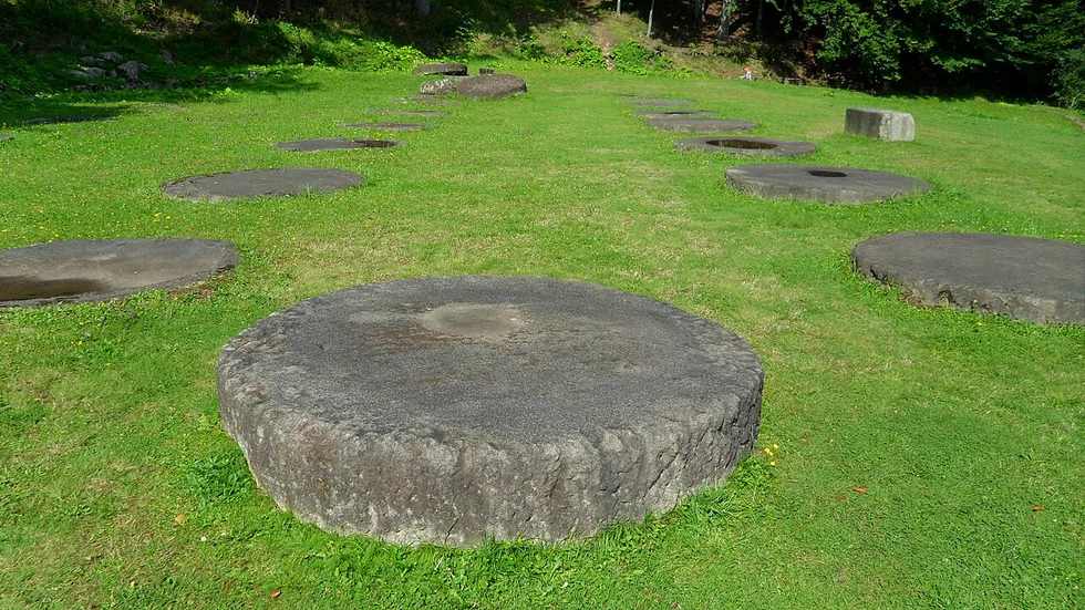 The great andesite temple in the sacred zone of Sarmizegetusa Regia, circular arrangements of stone column bases on the mountain terrace