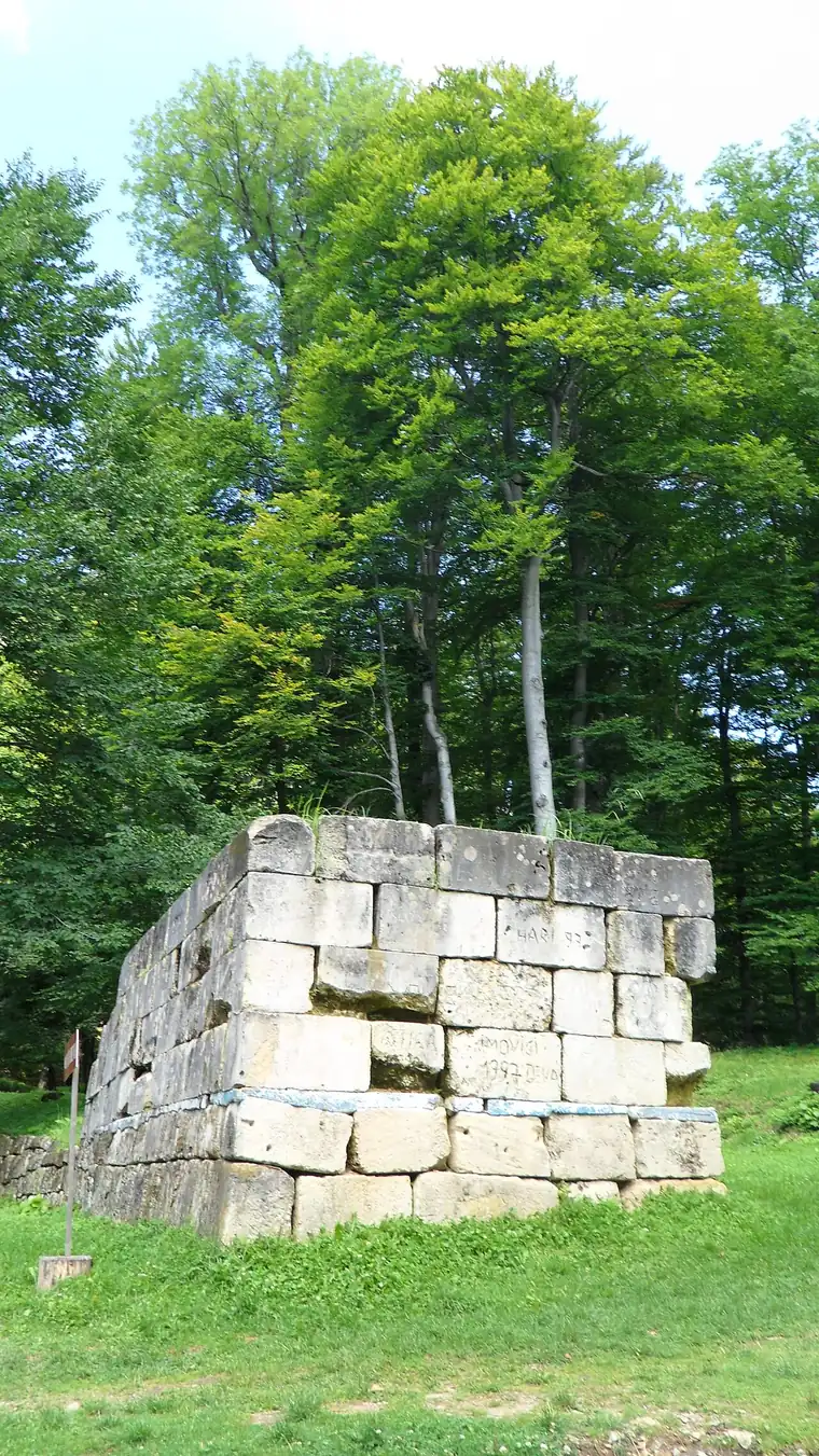 A surviving section of Dacian wall at Sarmizegetusa Regia built in the murus dacicus technique, large dressed stone blocks with a rubble core