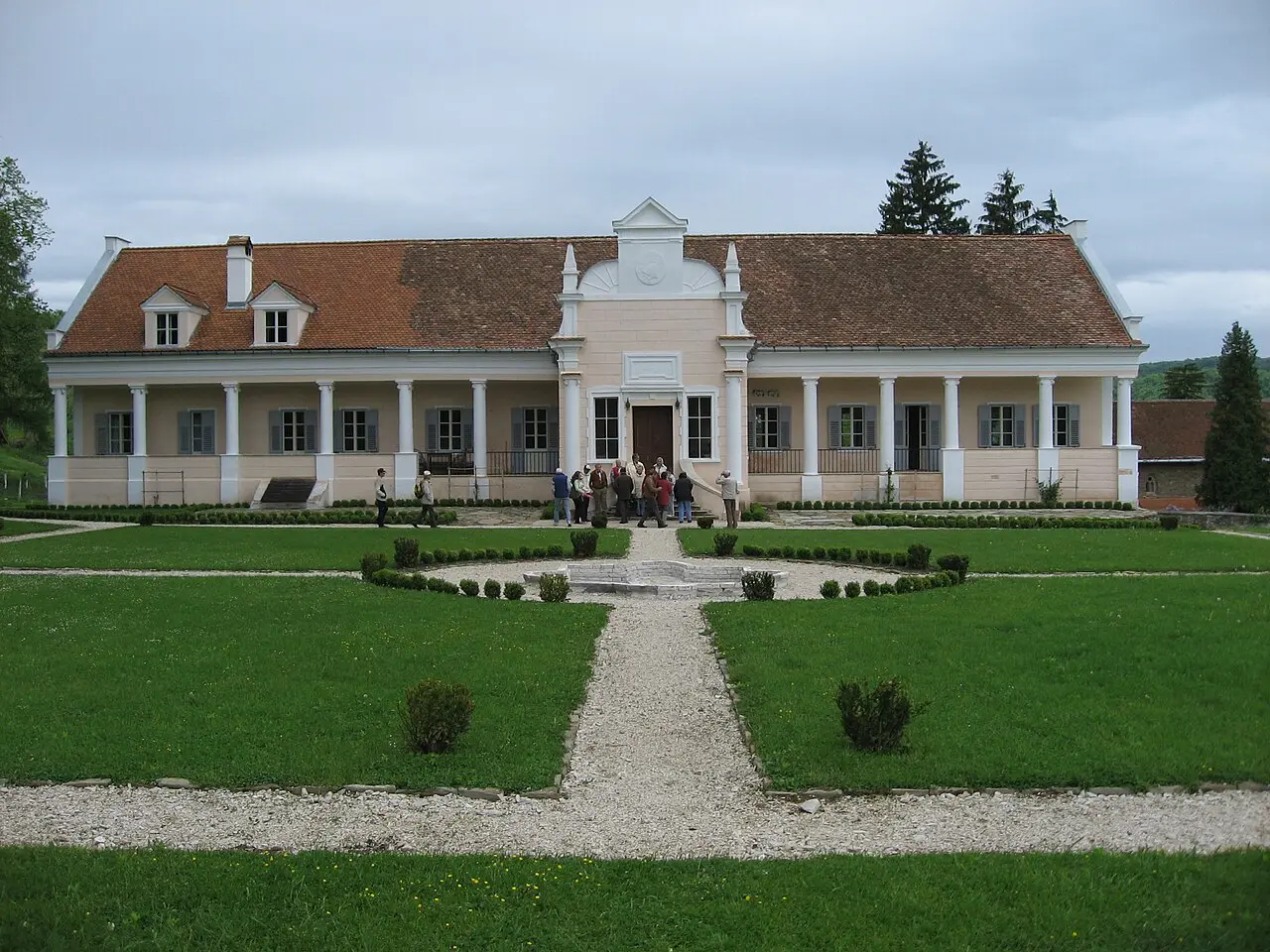 The restored Apafi Manor guesthouse in Malancrav, beside the fortified church