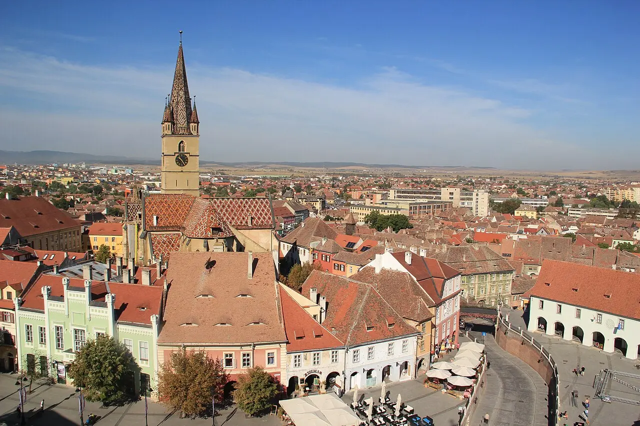 A sea of red-tiled rooftops in Sibiu with the narrow eyebrow dormer windows that give the town its nickname