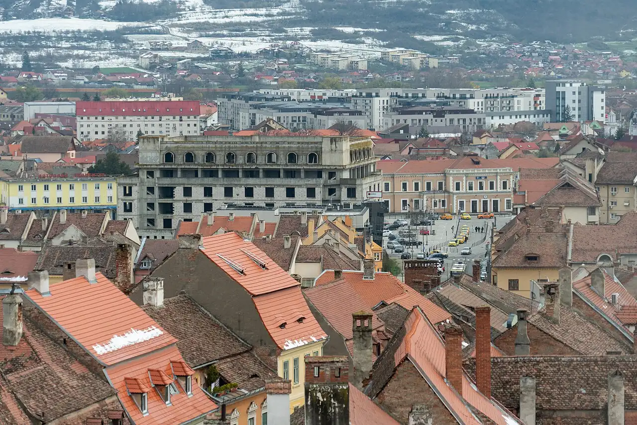 Rooftops of Sibiu seen from the Council Tower, dozens of old tiled roofs with the half-closed eyelid dormers that give the town its nickname