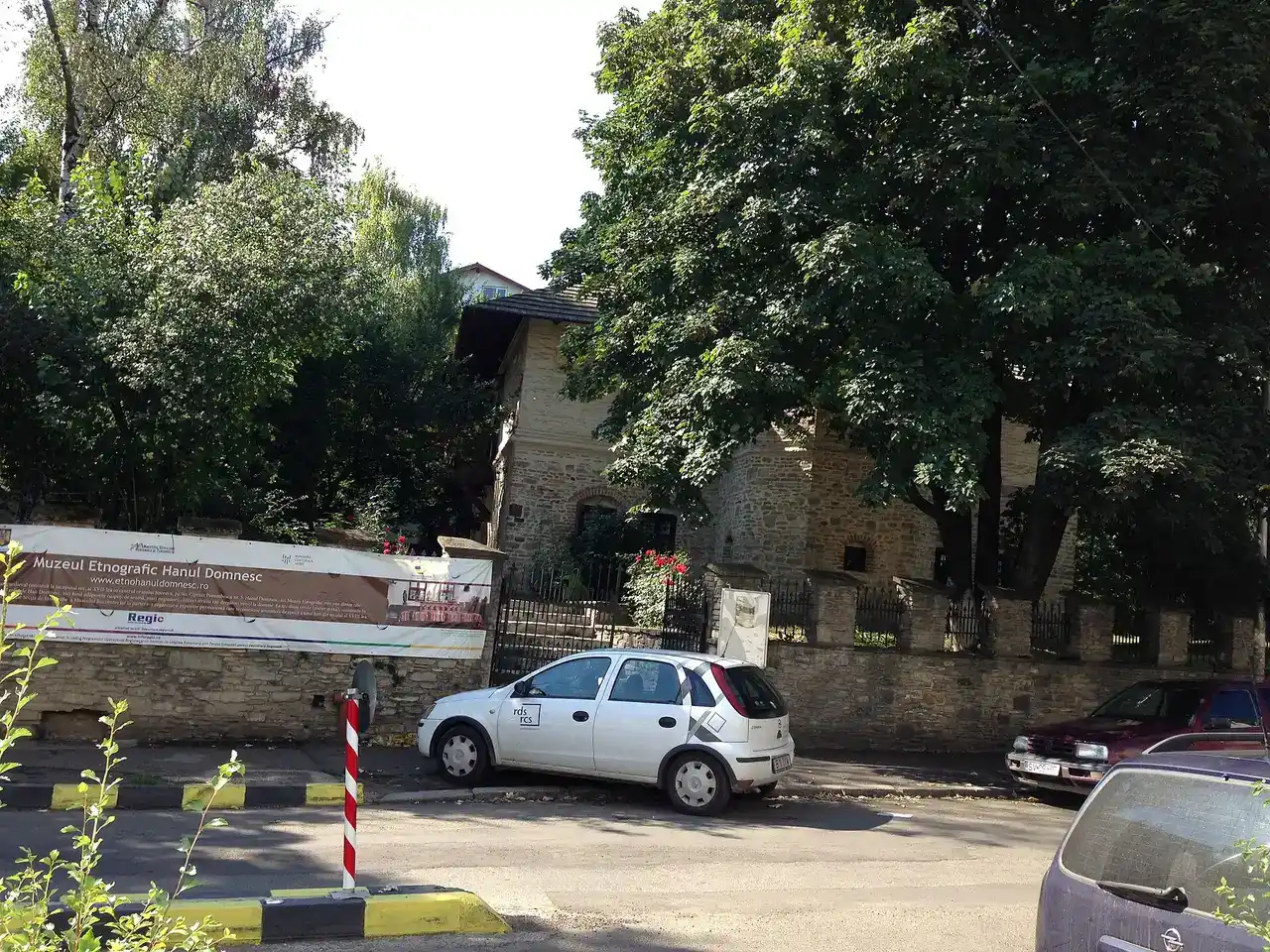 The stone facade and arched ground floor of Hanul Domnesc, the Princely Inn, in central Suceava