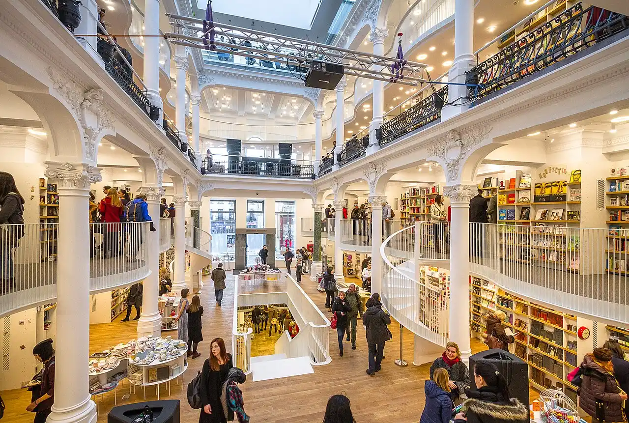 The white galleries and spiral staircase inside the Carturesti Carusel bookshop