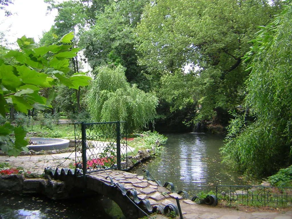 A shaded path through the Cismigiu Gardens in central Bucharest