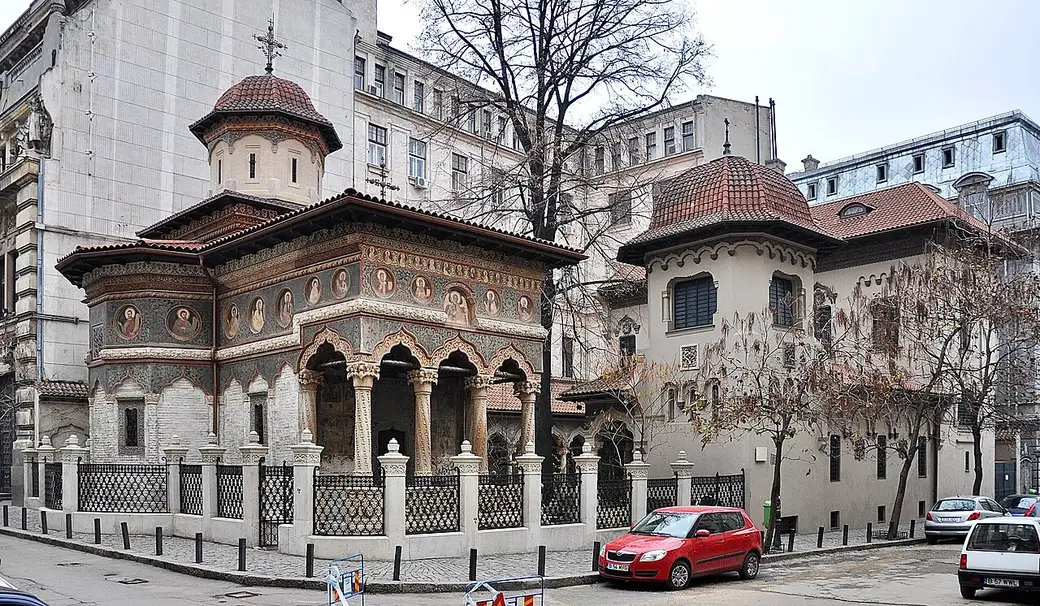The carved stone facade and porch of Stavropoleos Church in central Bucharest