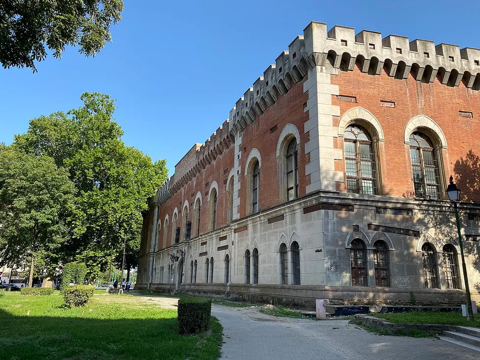 Huniade Castle in Timisoara, a solid brick medieval building with a tower, the oldest structure in the city, now the Banat Museum