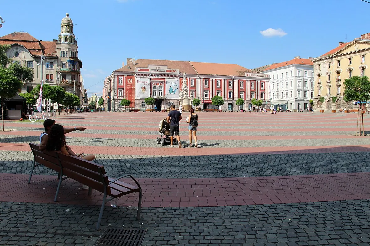 Piata Libertatii in Timisoara, the older civic square with the Old Town Hall and pastel Baroque facades around it
