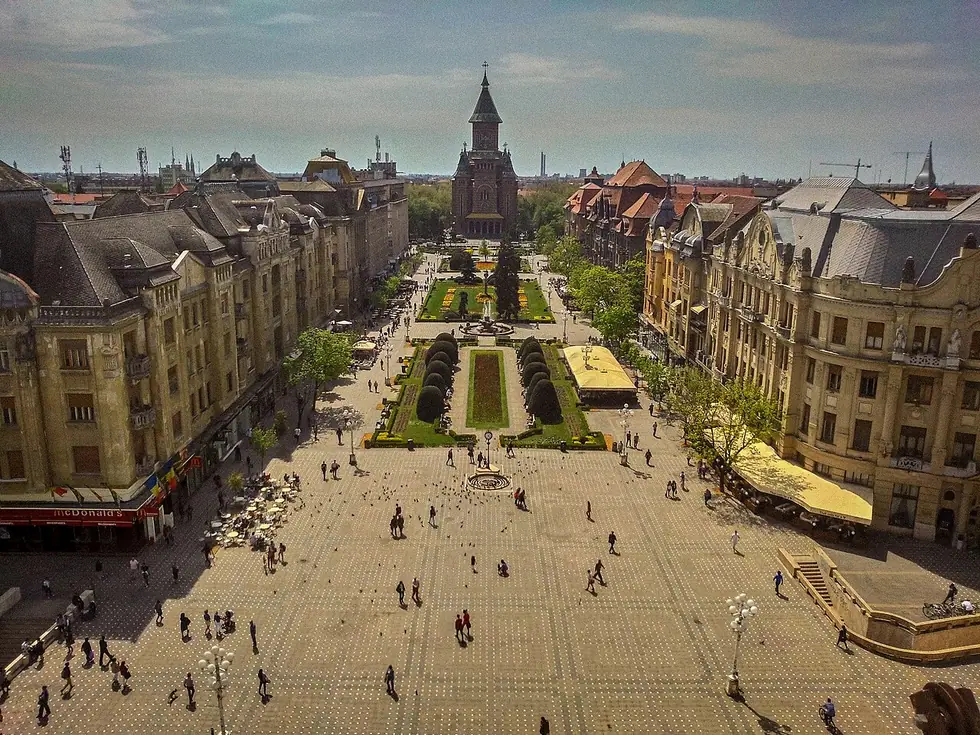 The opera end of Piata Victoriei in Timisoara, the National Theatre and Opera building closing the far end of the square