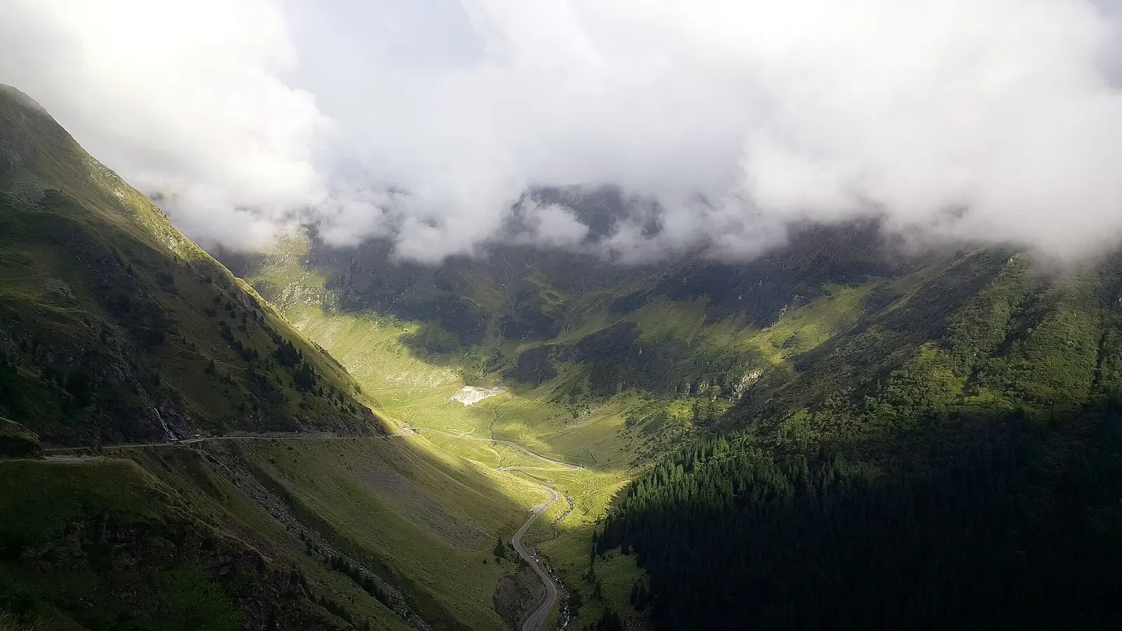 Balea Lake sitting in its rock bowl below the Fagaras peaks at the top of the pass