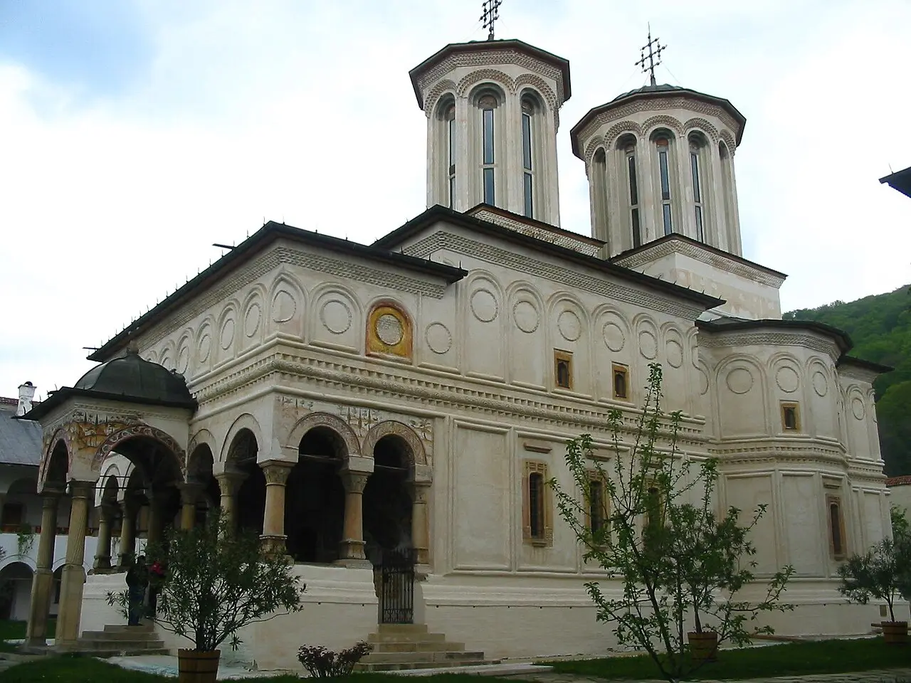 The painted facade and porch of the main church at Horezu Monastery