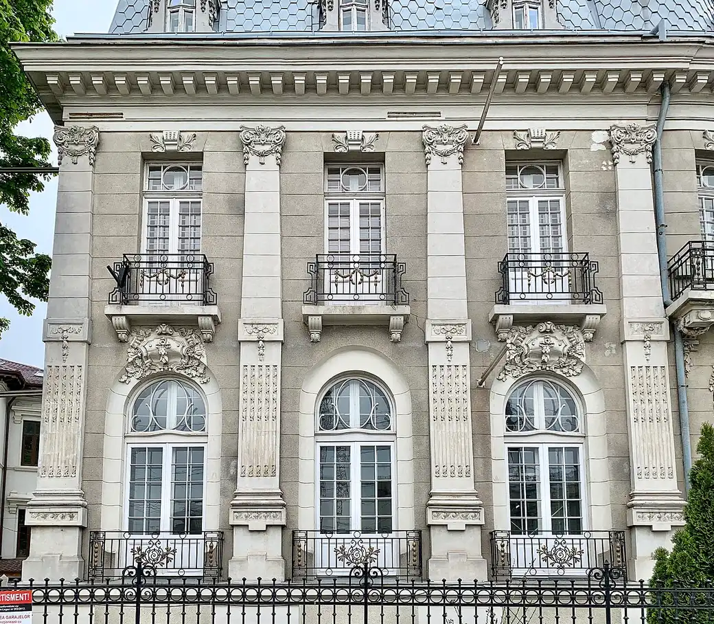 An ornate early-20th-century apartment building on Piata Romana in Bucharest, the leafy northern district known for its restaurants