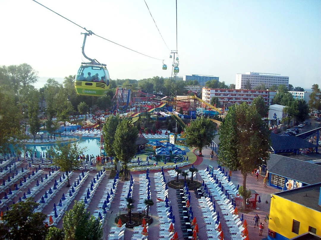 The Telegondola cable car and the Aqua Magic water park in central Mamaia, cabins running above the resort