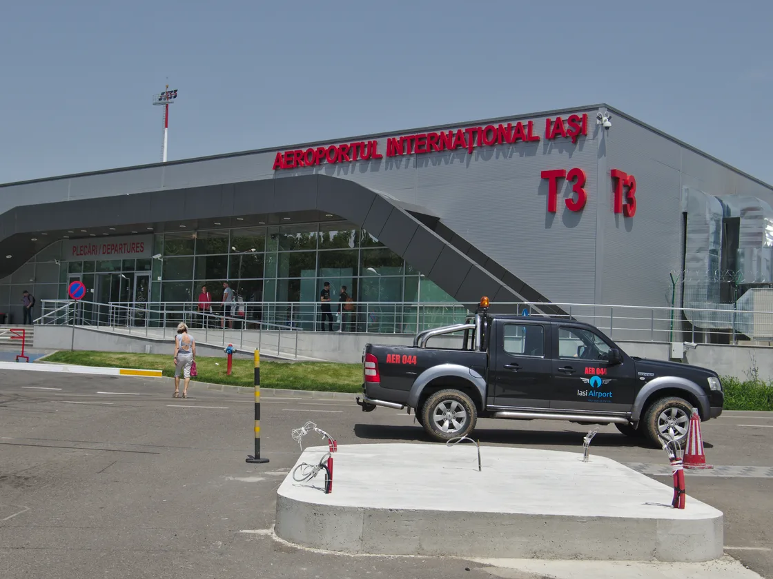 The modern T3 terminal building at Iasi airport (IAS) in northeast Romania, a clean glass-and-steel frontage, gateway to Moldavia and the Bucovina monasteries